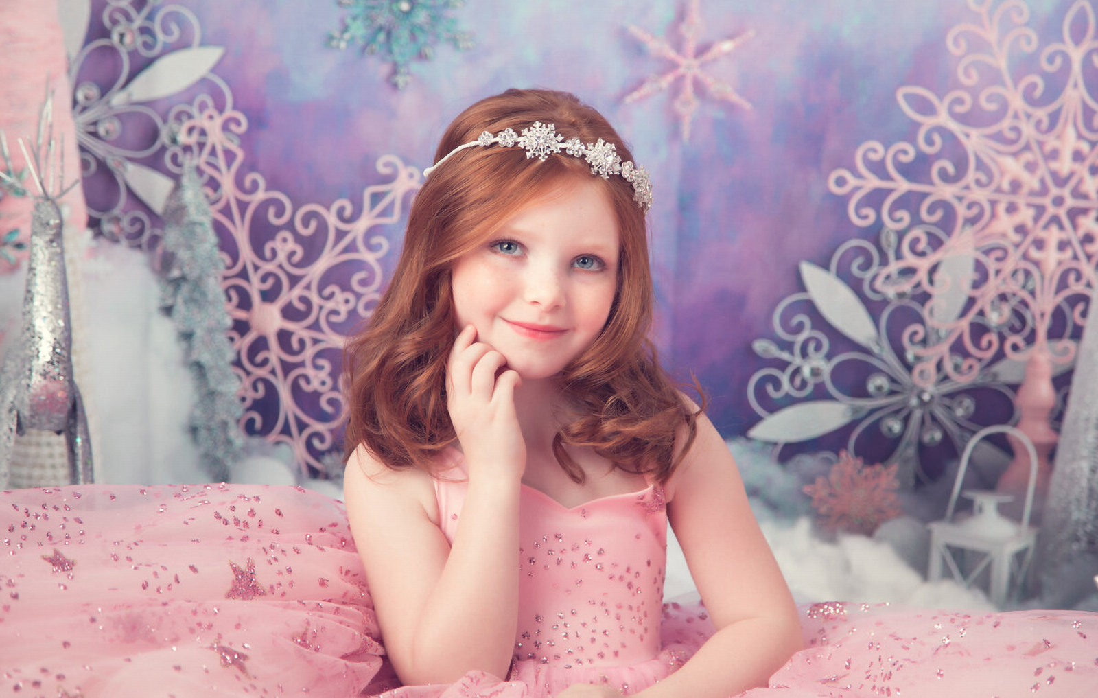 girl in pink dress for studio holiday portrait posing for fine art holiday photography