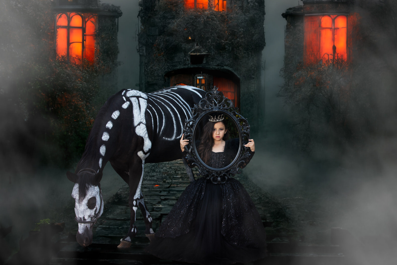 Girl in black dress with skeleton horse posing for Couture Halloween Photography